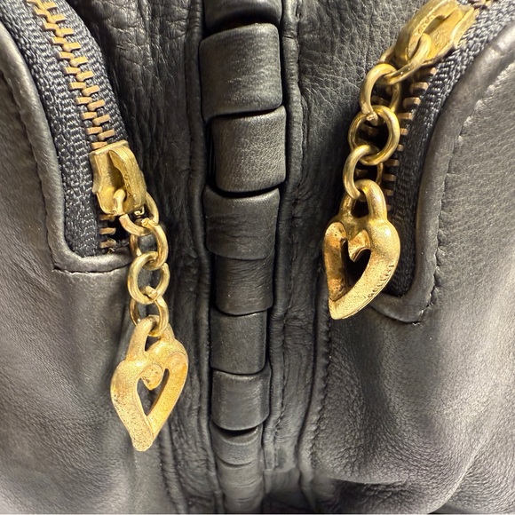 Chic Black Leather Backpack with Gold Accents - Picture 2 of 10